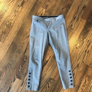 Slim fitting ankle pants with button detail